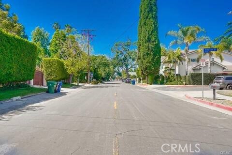 5032 Amestoy Encino, CA 91316 - Photo 4 of 22 a view of a street with houses on both side