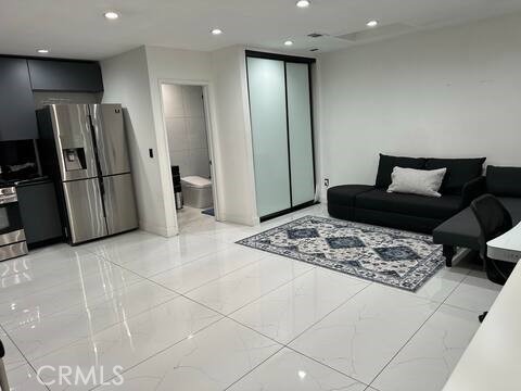 5032 Amestoy Encino, CA 91316 - Photo 10 of 22 a living room with furniture