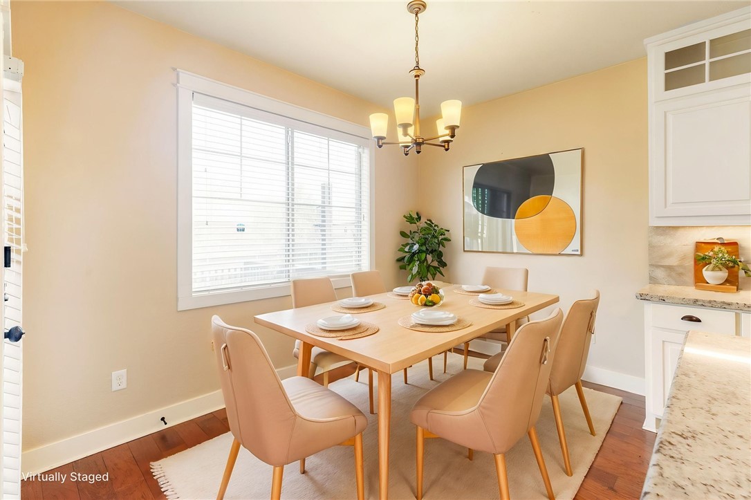 2136 Rockcliffe Loop College Station, TX 77845 - Photo 21 of 48 a view of a dining room with furniture window and wooden floor