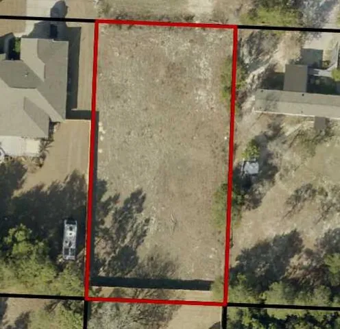 a house view with a garden space