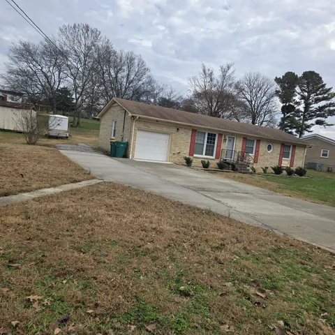 a house view with a garden space