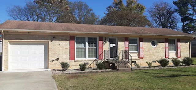 a view of house with backyard porch and furniture