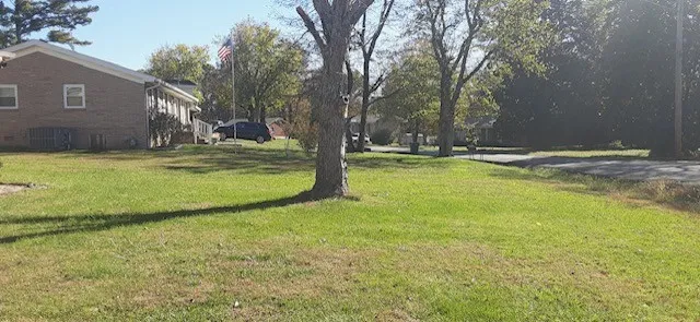 a view of a swimming pool with an outdoor space and seating area