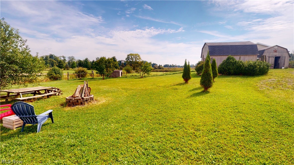 8855 Congress Road Lodi, OH 44254 - Photo 23 of 29 Firepit and rear