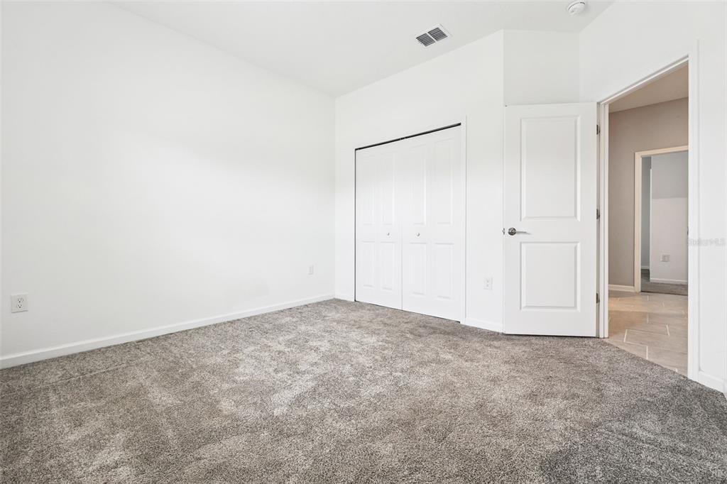 781 Taurus Lane St. Cloud, FL 34772 - Photo 19 of 36 a view of an empty room