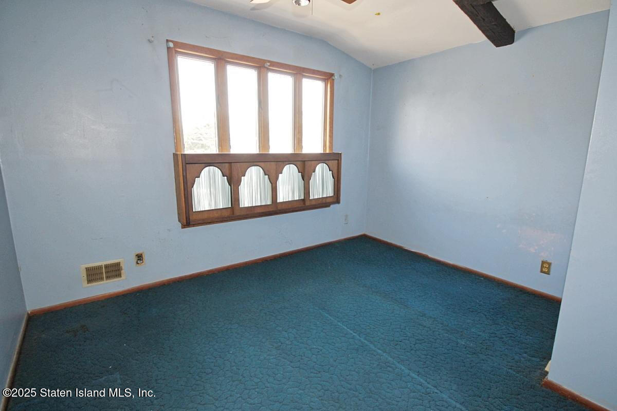 3 Windermere Road Staten Island, NY 10305 - Photo 17 of 37 an empty room with a window