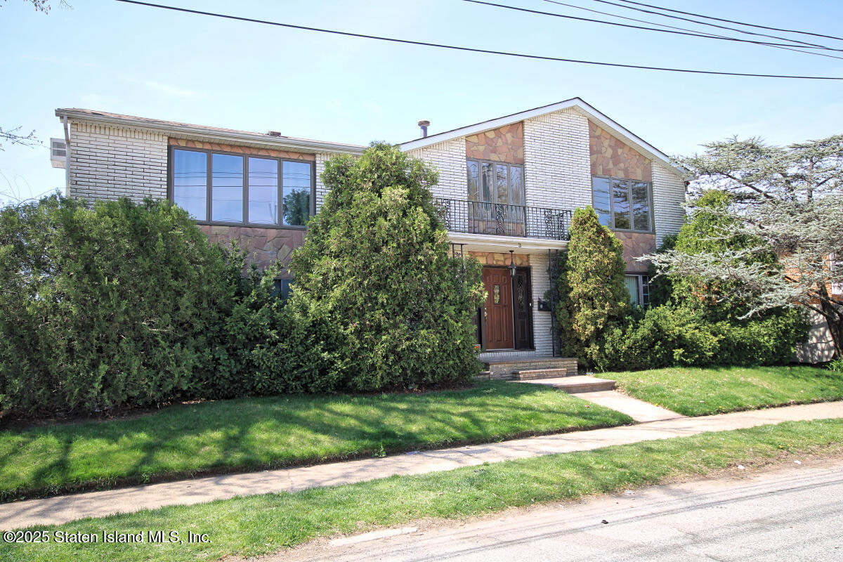3 Windermere Road Staten Island, NY 10305 - Photo 2 of 37 a front view of a house with garden