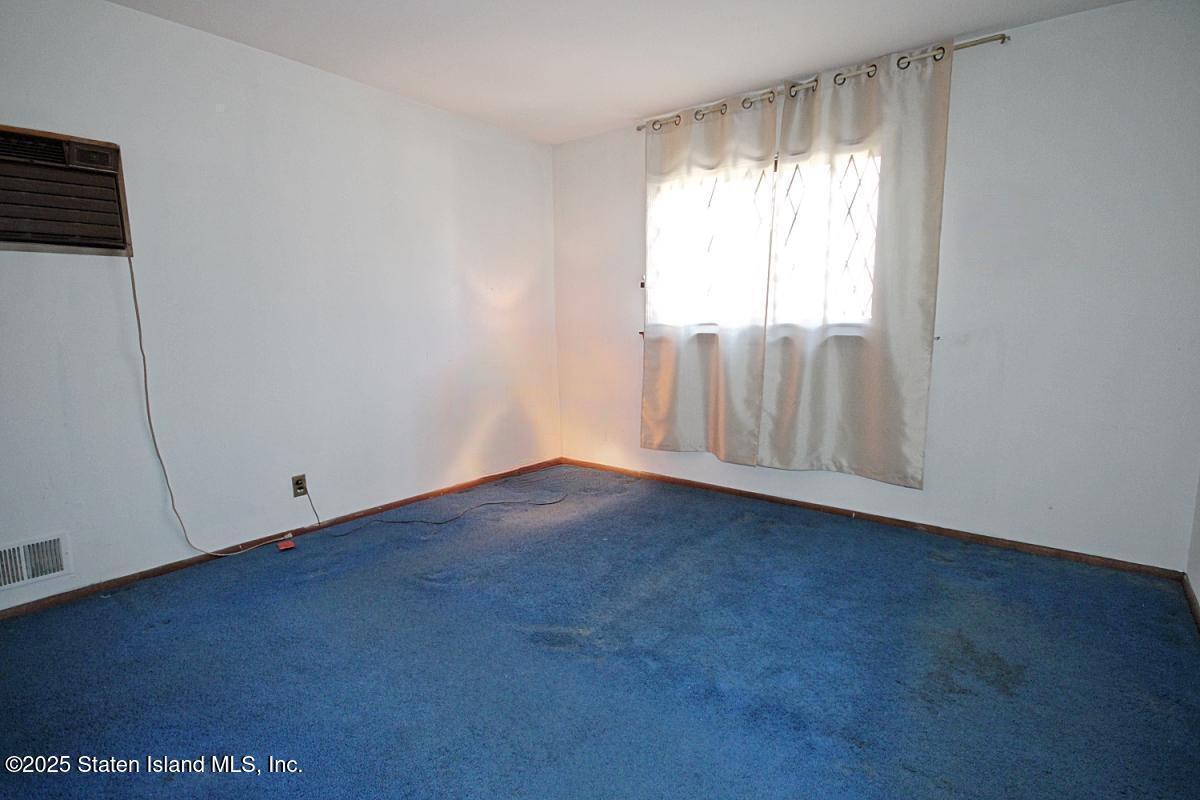 3 Windermere Road Staten Island, NY 10305 - Photo 26 of 37 a view of an empty room with a window