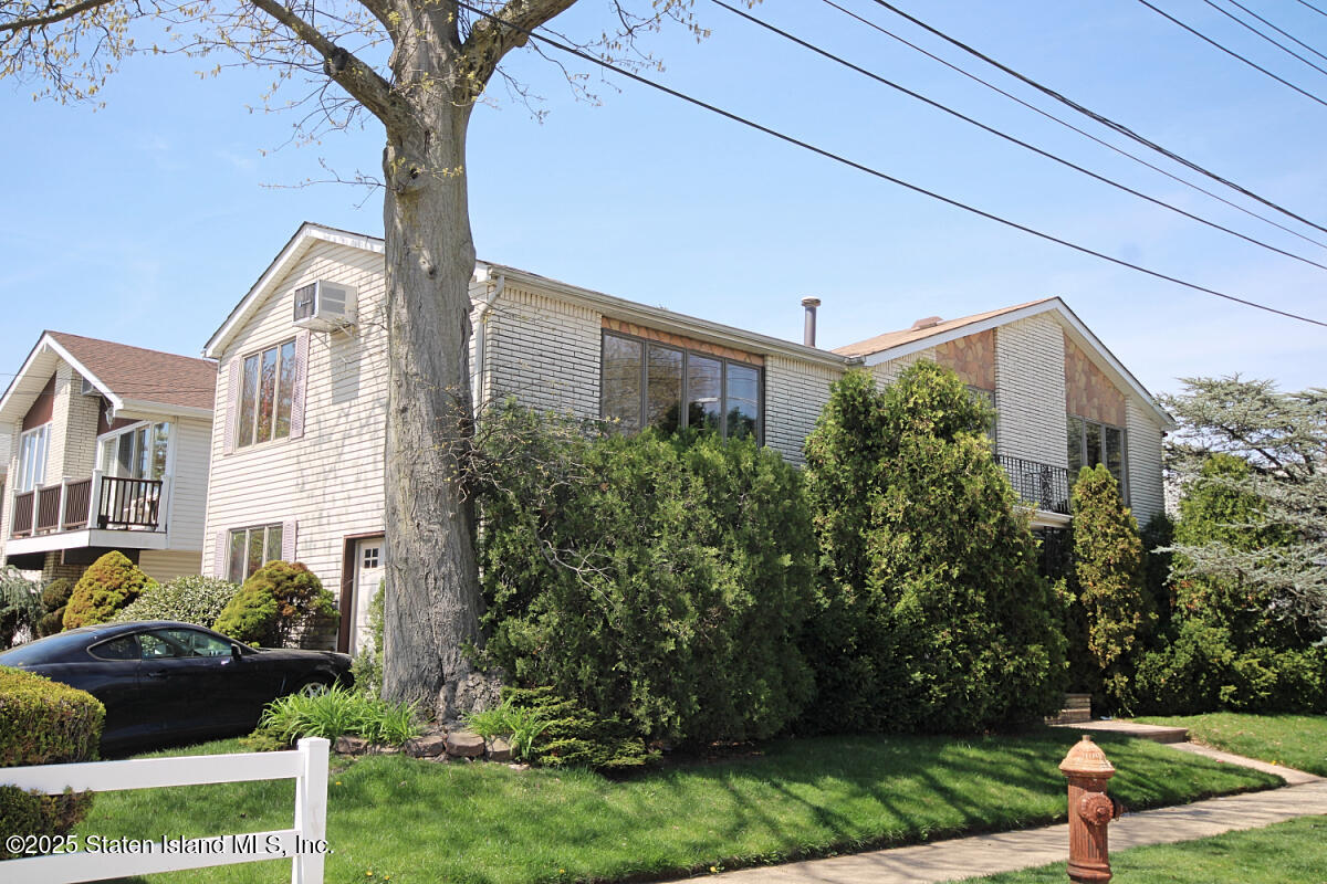 3 Windermere Road Staten Island, NY 10305 - Photo 3 of 37 a front view of a house with a yard