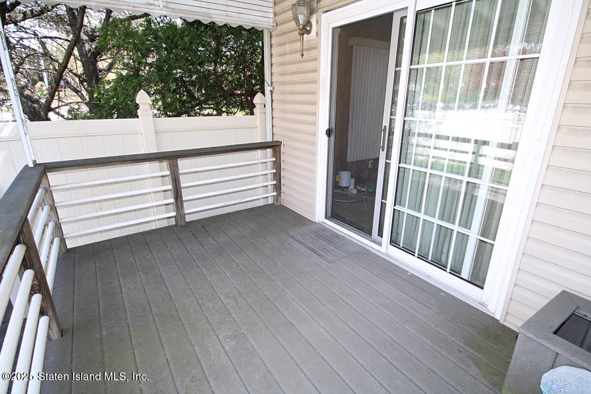 3 Windermere Road Staten Island, NY 10305 - Photo 32 of 37 a view of outdoor space with deck and window