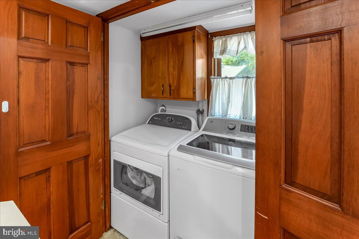200 North State Road Springfield, PA 19064 - Photo 27 of 46 a utility room with dryer and washer