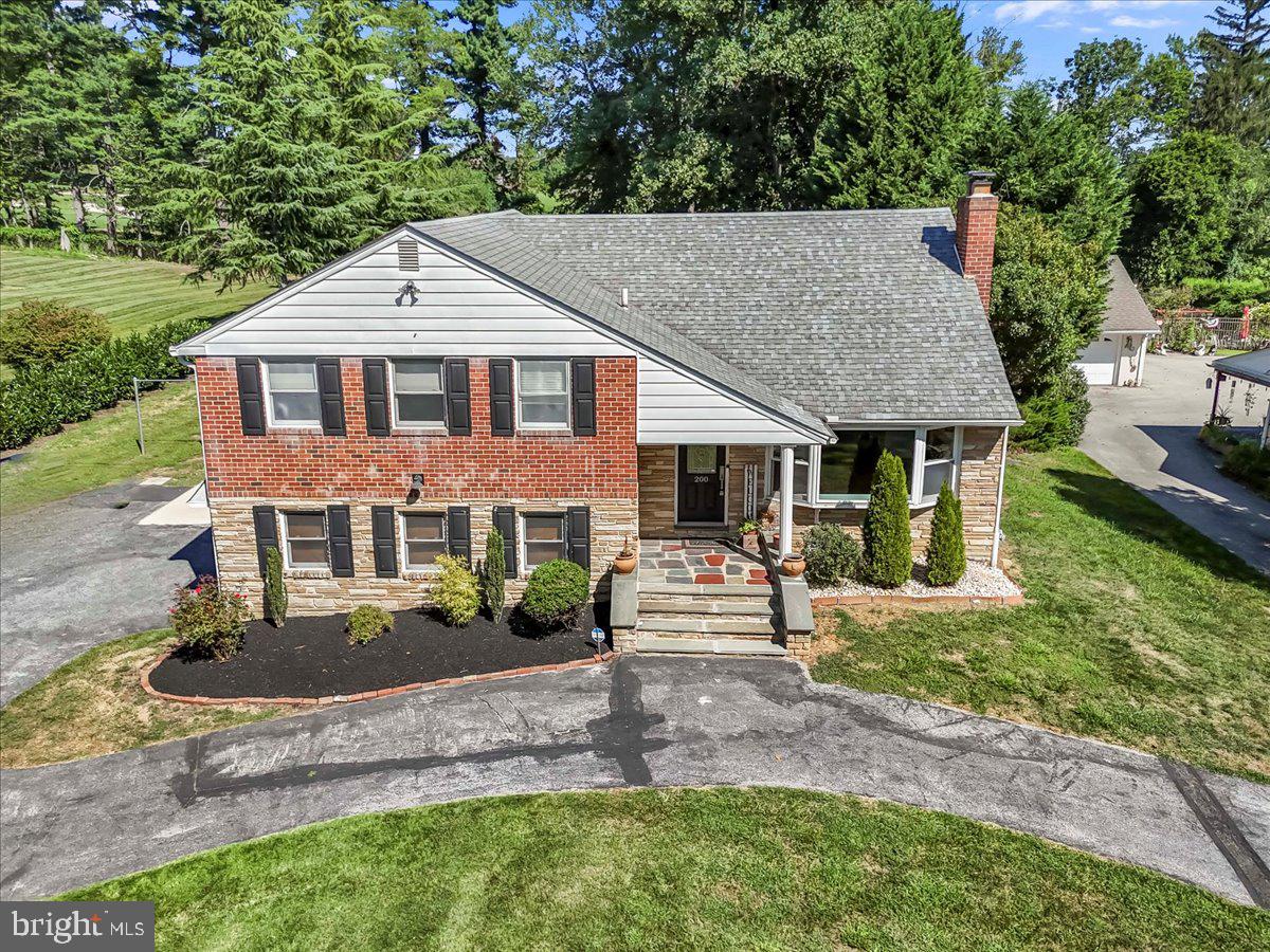 200 North State Road Springfield, PA 19064 - Photo 38 of 46 a front view of a house with a yard