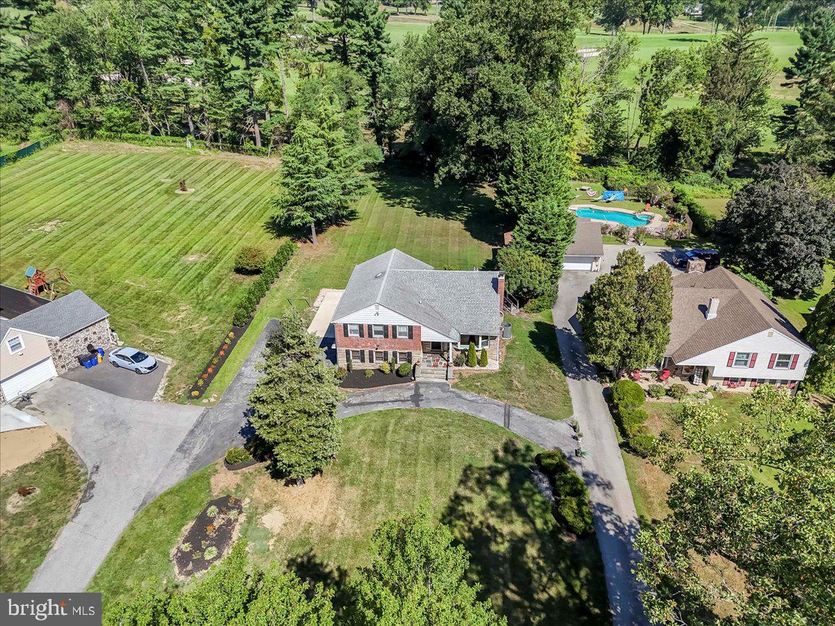 200 North State Road Springfield, PA 19064 - Photo 40 of 46 an aerial view of a house with a yard basket ball court and outdoor seating