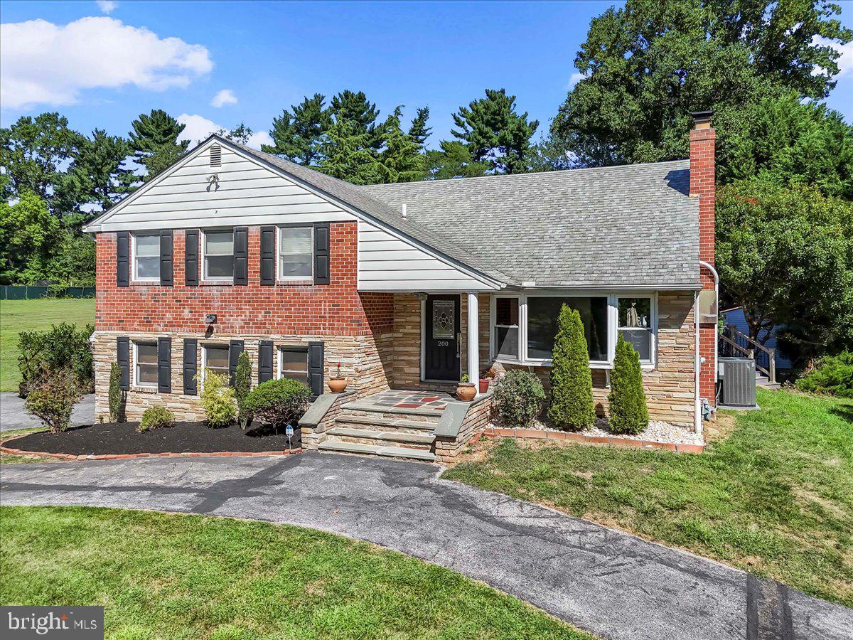 200 North State Road Springfield, PA 19064 - Photo 46 of 46 a front view of a house with garden