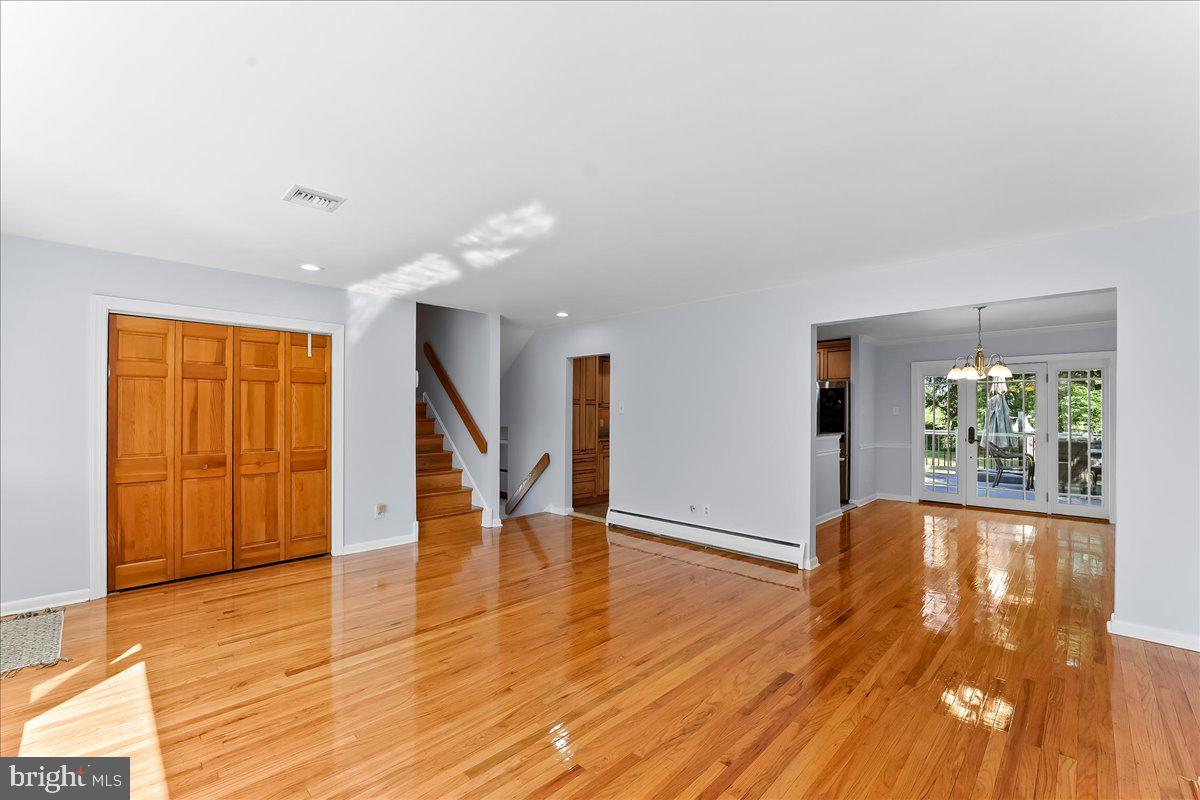 200 North State Road Springfield, PA 19064 - Photo 5 of 46 a view of empty room with wooden floor and fan