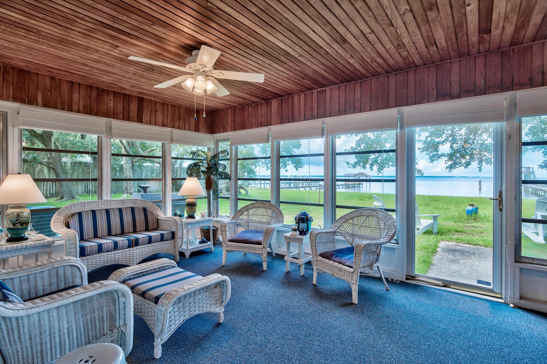 2476 Bay Grove Road Freeport, FL 32439 - Photo 10 of 27 a living room with furniture and a large window