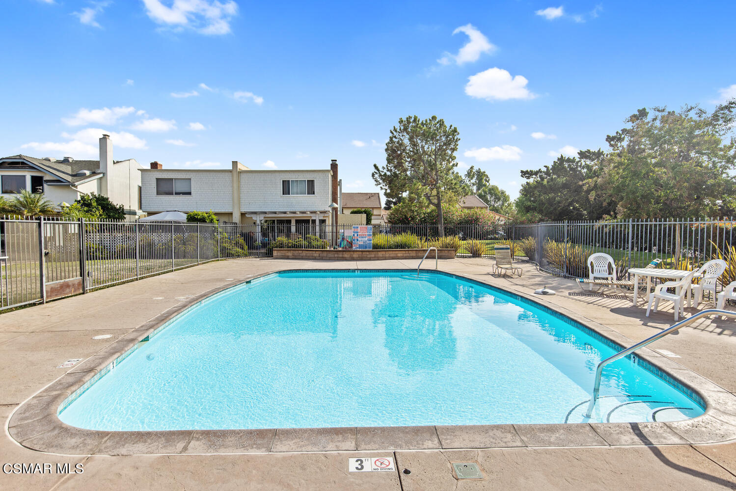 1657 Dockside Lane Camarillo, CA 93010 - Photo 22 of 22 a swimming pool with outdoor seating and yard