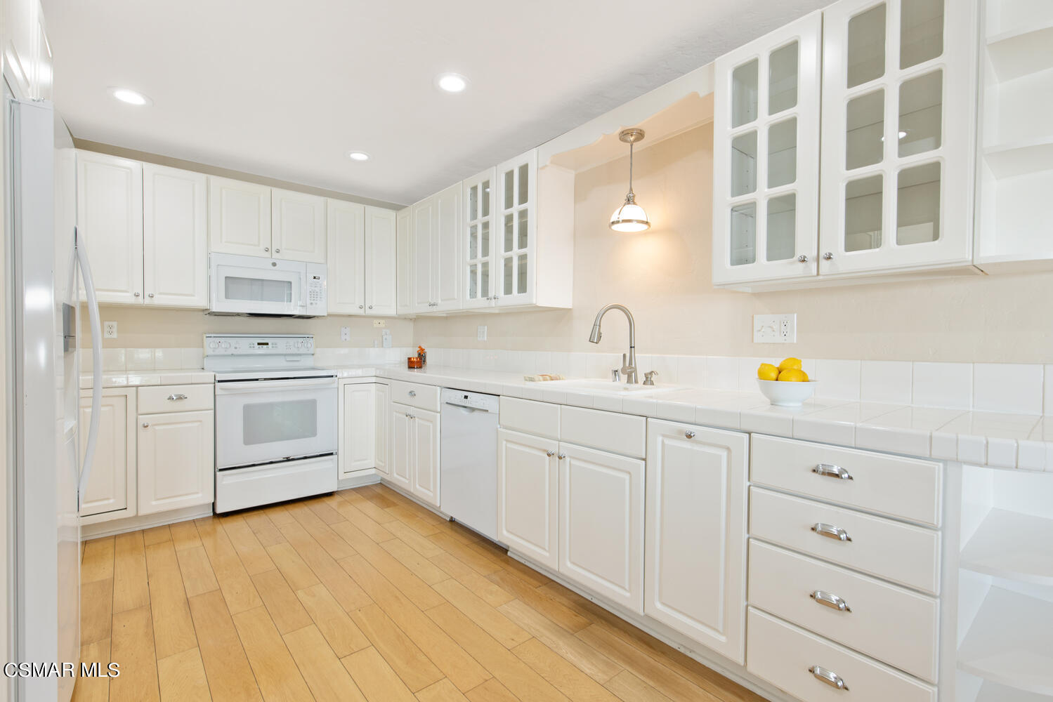 1657 Dockside Lane Camarillo, CA 93010 - Photo 8 of 22 a kitchen with cabinets a sink and appliances