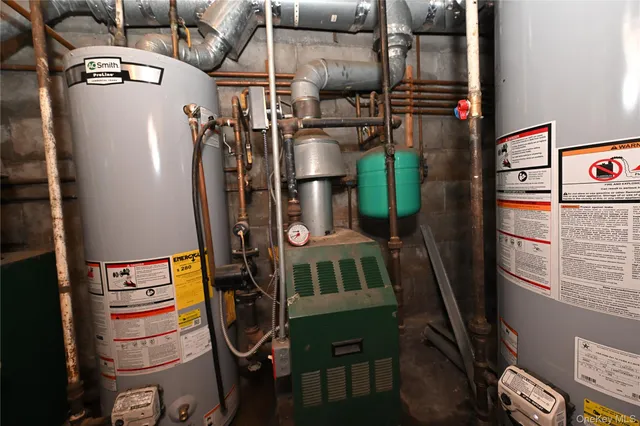 a view of storage and utility room with washer and dryer