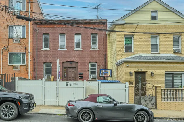 a view of the patio with table and chairs and potted plants