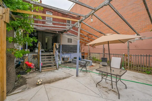 a view of a room with wooden walls