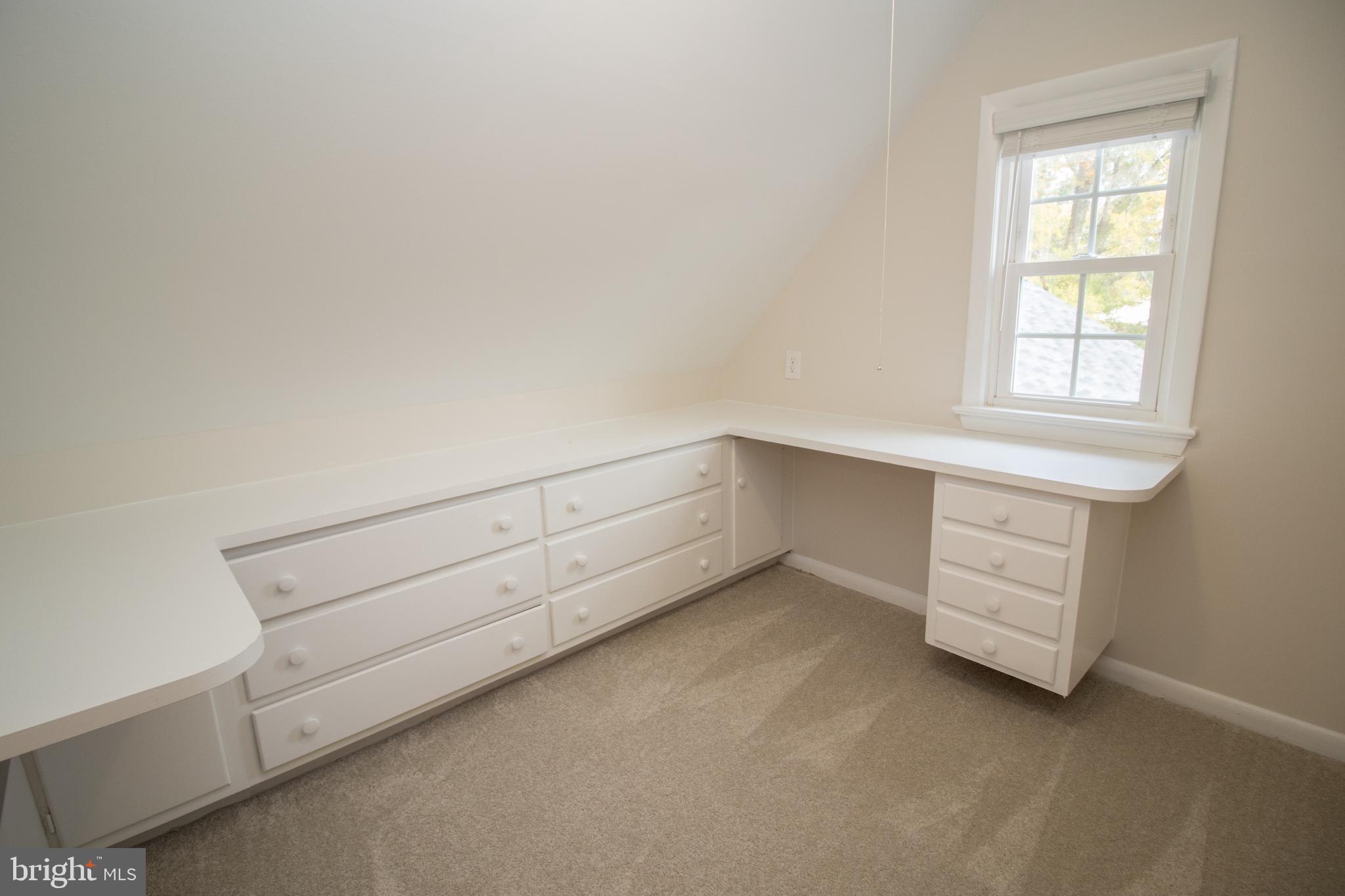 20697 Chingville Road Leonardtown, MD 20650 - Photo 75 of 87 an empty room with a cabinet and mirrors