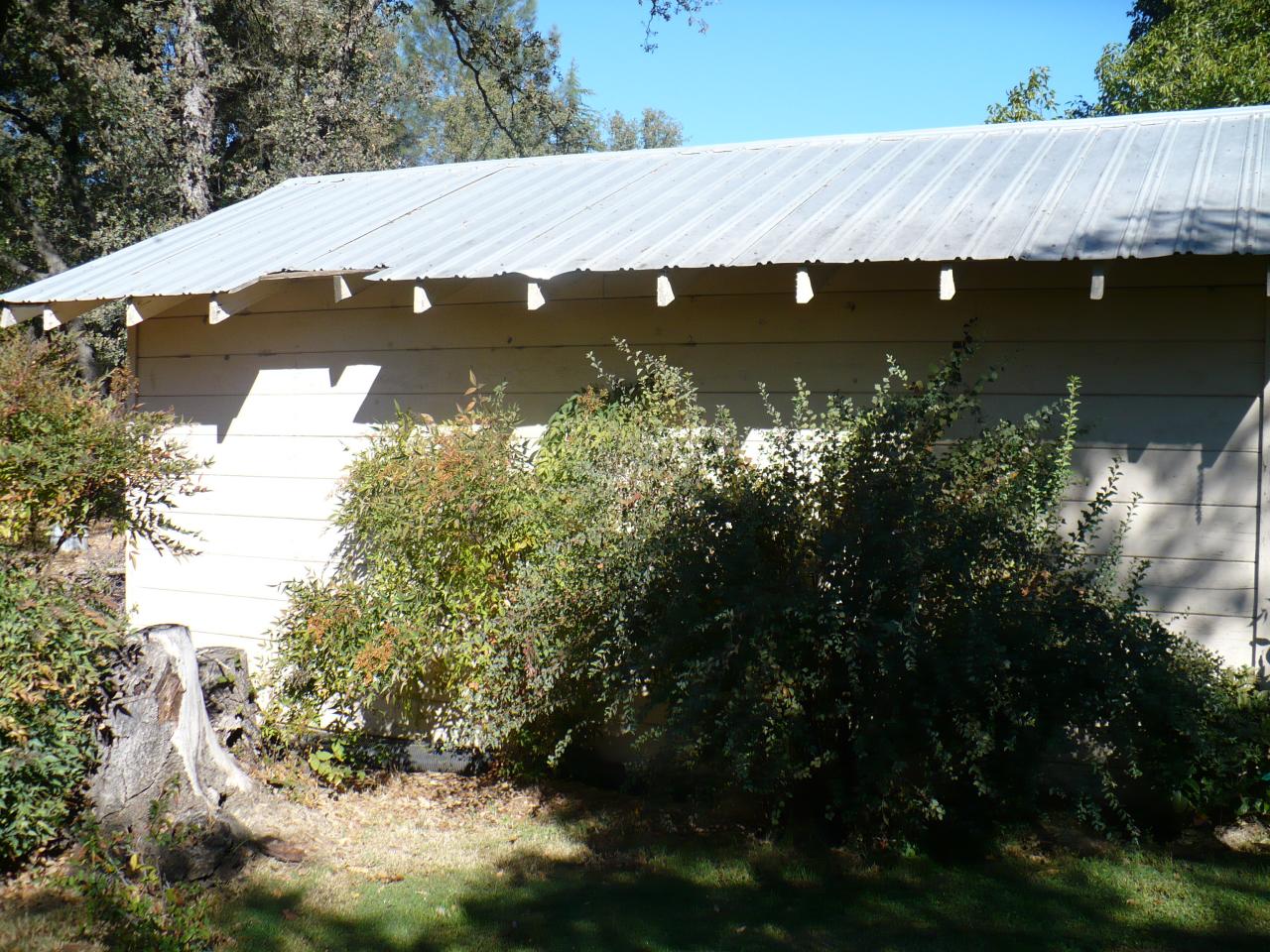 21334 Dersch Road Anderson, CA 96007 - Photo 16 of 24 a view of a house with a yard