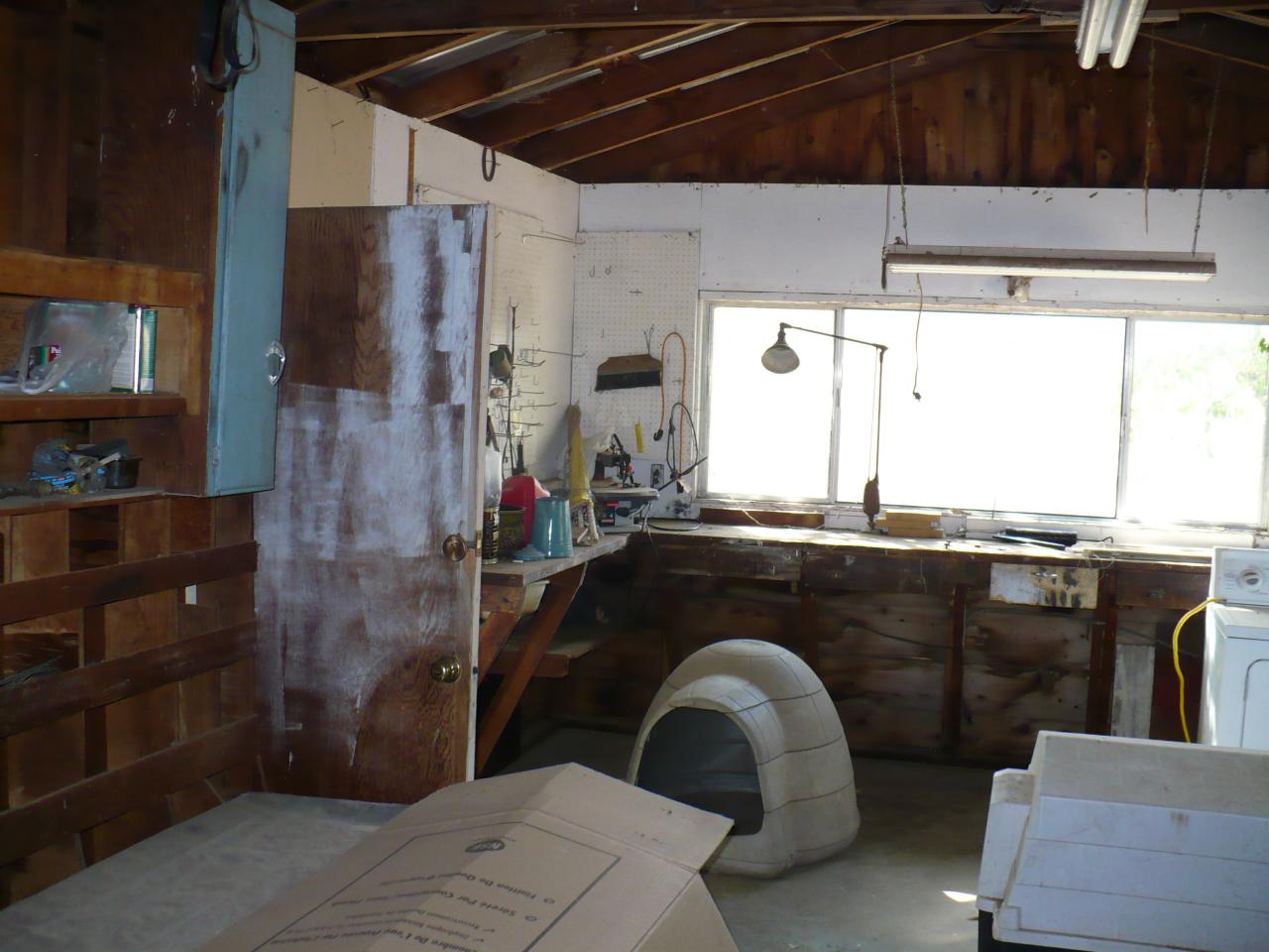 21334 Dersch Road Anderson, CA 96007 - Photo 17 of 24 a kitchen with a sink and a refrigerator