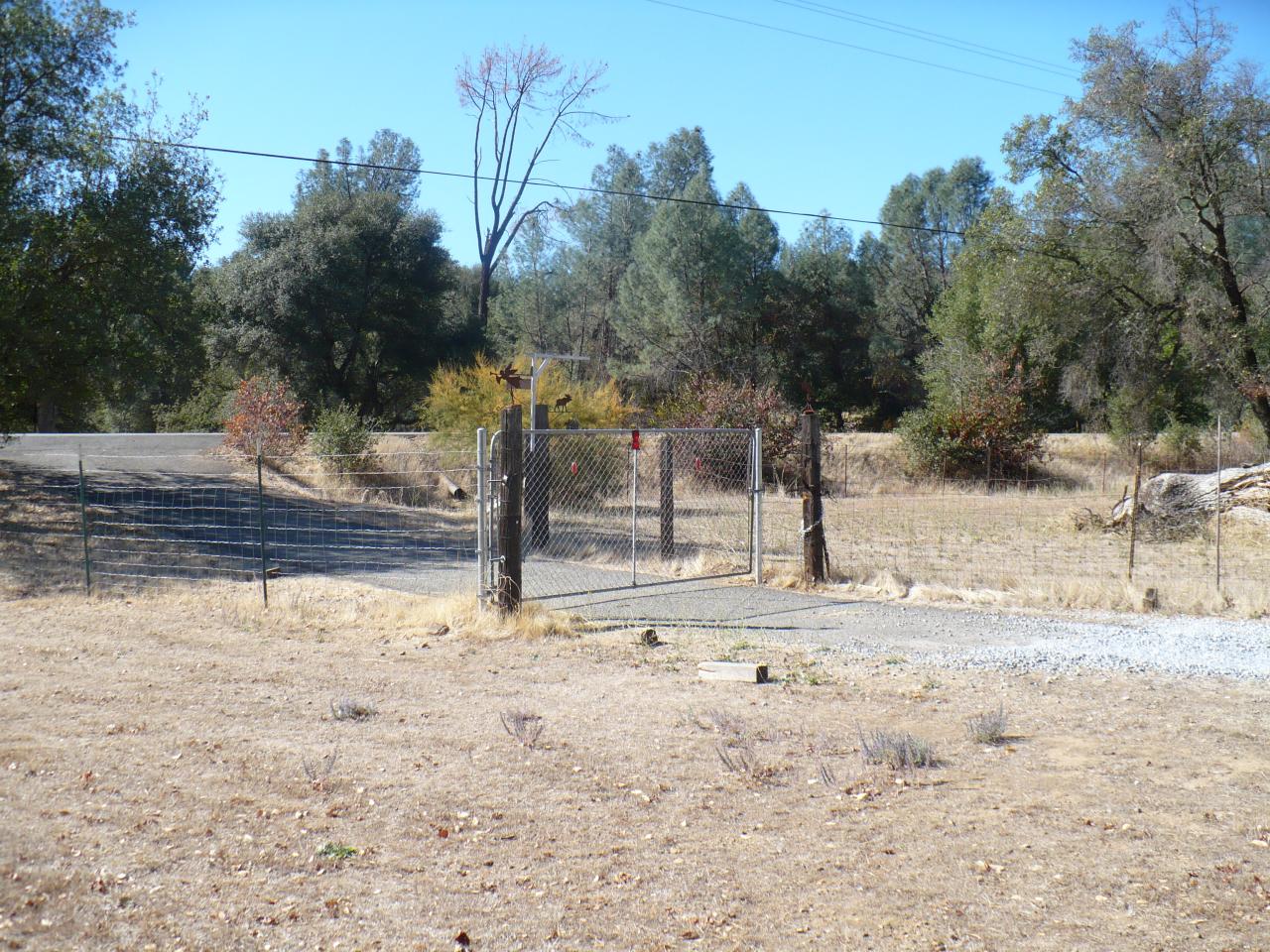 21334 Dersch Road Anderson, CA 96007 - Photo 20 of 24 a view of a yard with snow on the road
