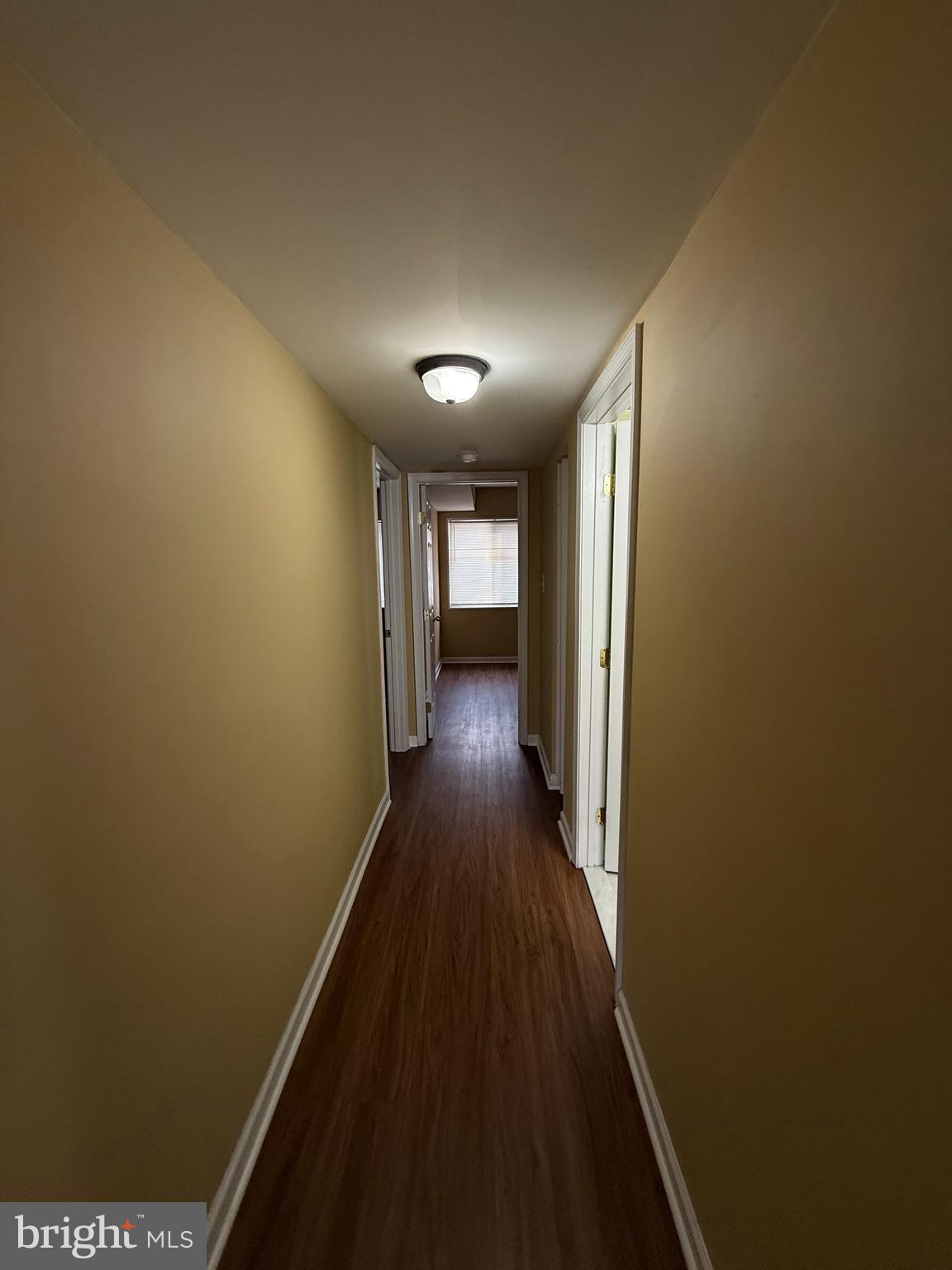 1403 Northgate Square, Unit 12B Reston, VA 20190 - Photo 8 of 16 a view of hallway with wooden floor