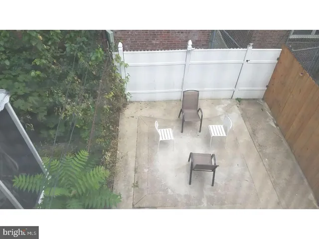 a view of balcony with furniture