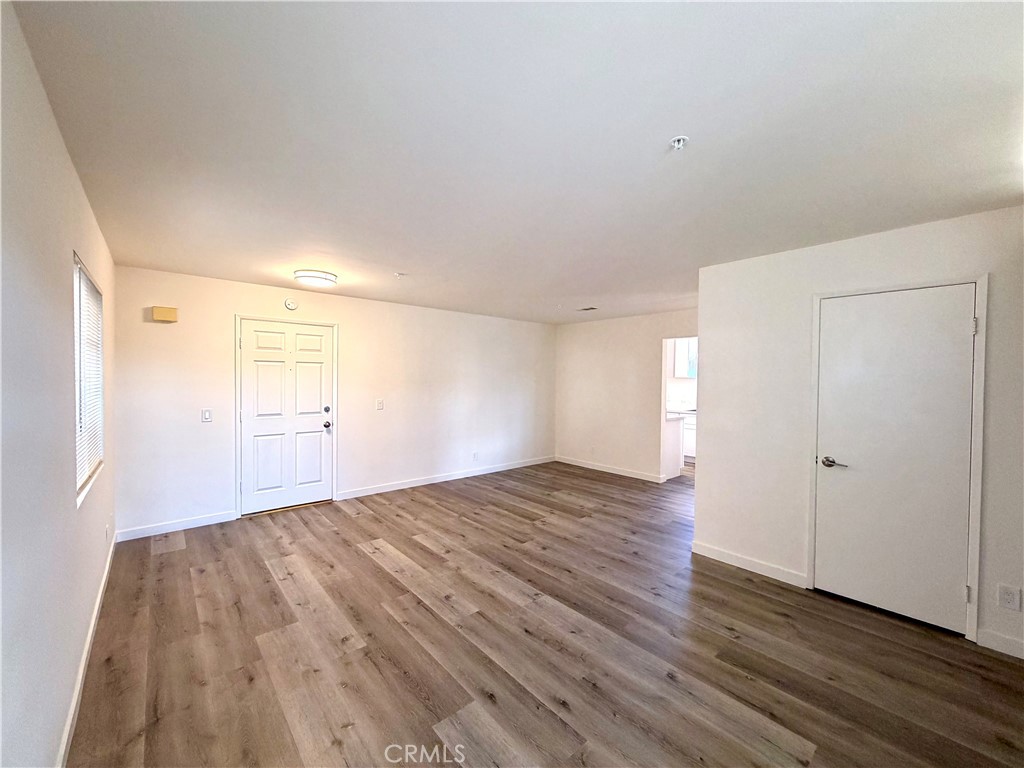 402 North Curtis Avenue, Unit A Alhambra, CA 91801 - Photo 3 of 12 a view of empty room with wooden floor