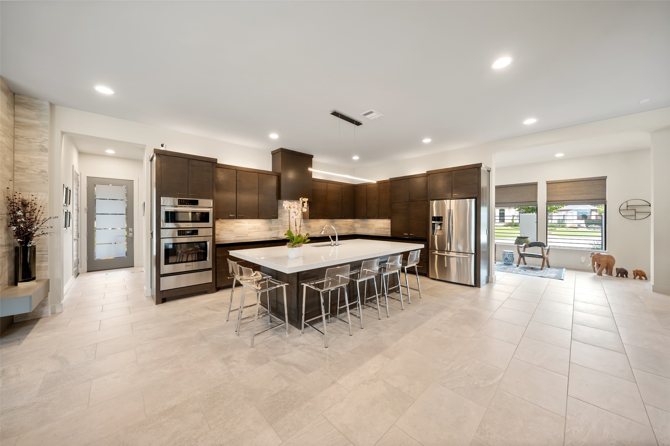 24902 Delaney Knoll Spring, TX 77389 - Photo 10 of 49 a large kitchen with a table and chairs