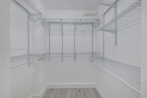 a view of a room with racks on the wall