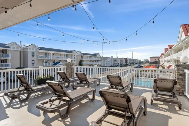 a view of a terrace with furniture