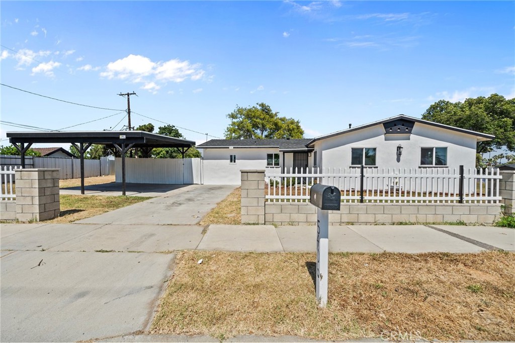 5406 Lewis Avenue Riverside, CA 92503 - Photo 1 of 1 a front view of a house with stairs