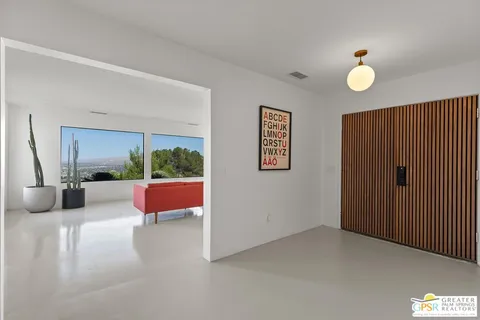 a view of an empty room and window