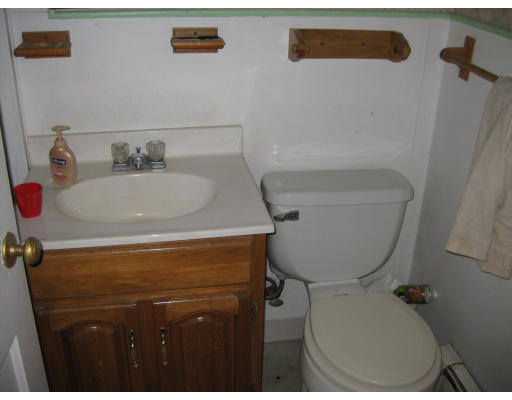 17 South Sturbridge Road Charlton, MA 01507 - Photo 14 of 26 a bathroom with a toilet and a sink