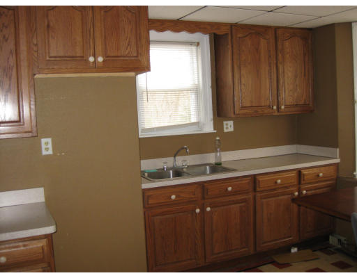 17 South Sturbridge Road Charlton, MA 01507 - Photo 20 of 26 a kitchen with a sink and cabinets