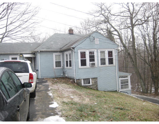17 South Sturbridge Road Charlton, MA 01507 - Photo 25 of 26 a front view of a house with a yard
