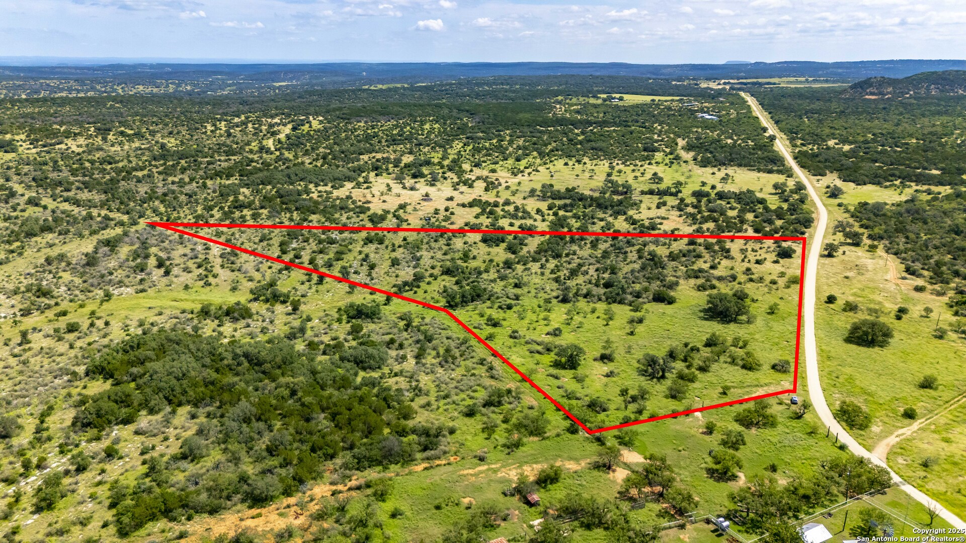 Lot 4 Jack Rabbit Road Harper, TX 78631 - Photo 9 of 19 a view of a lake with a garden