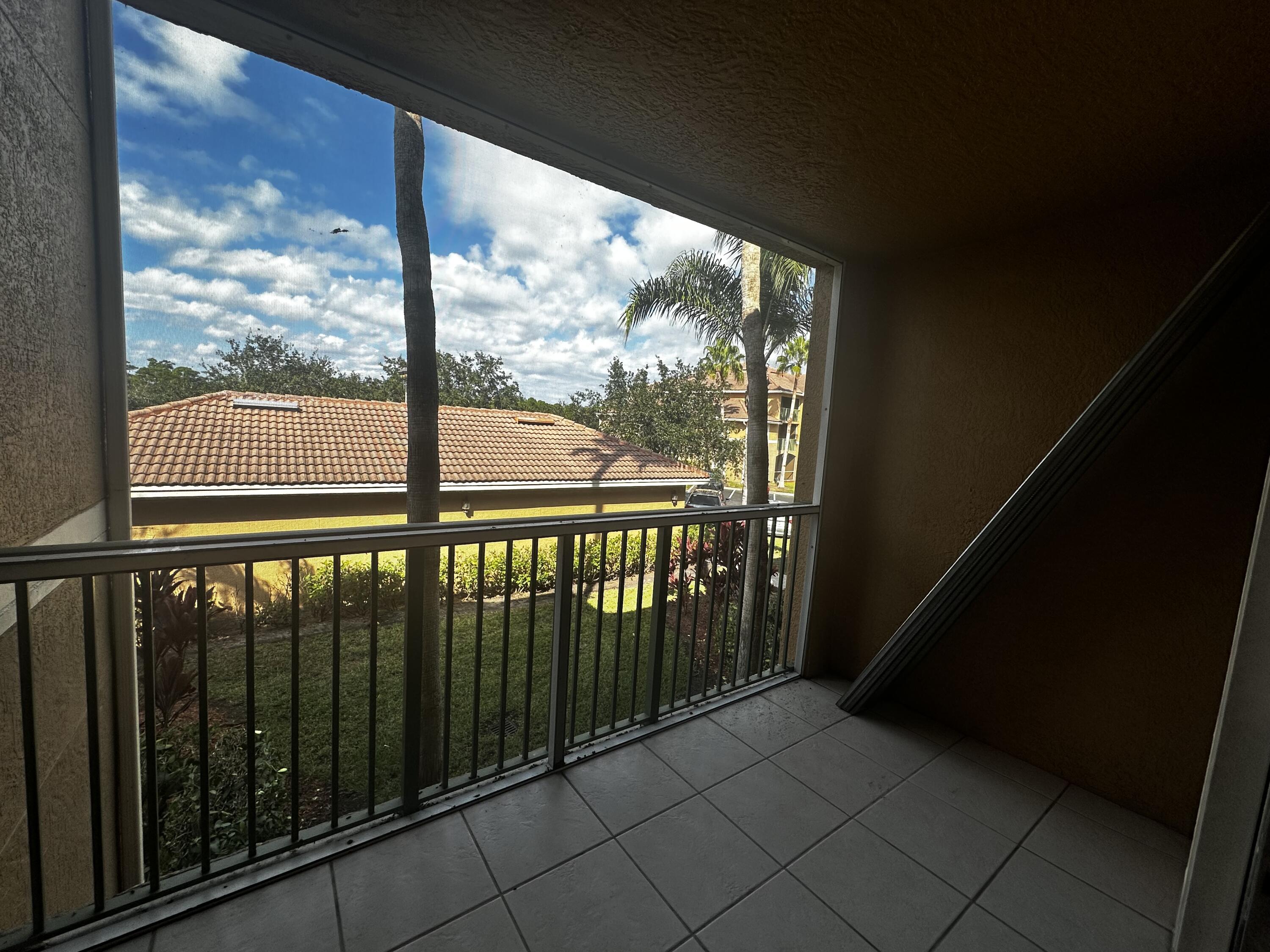 3615 Northwest Mediterranean Lane, Unit 13205 Jensen Beach, FL 34957 - Photo 11 of 14 a view of a balcony