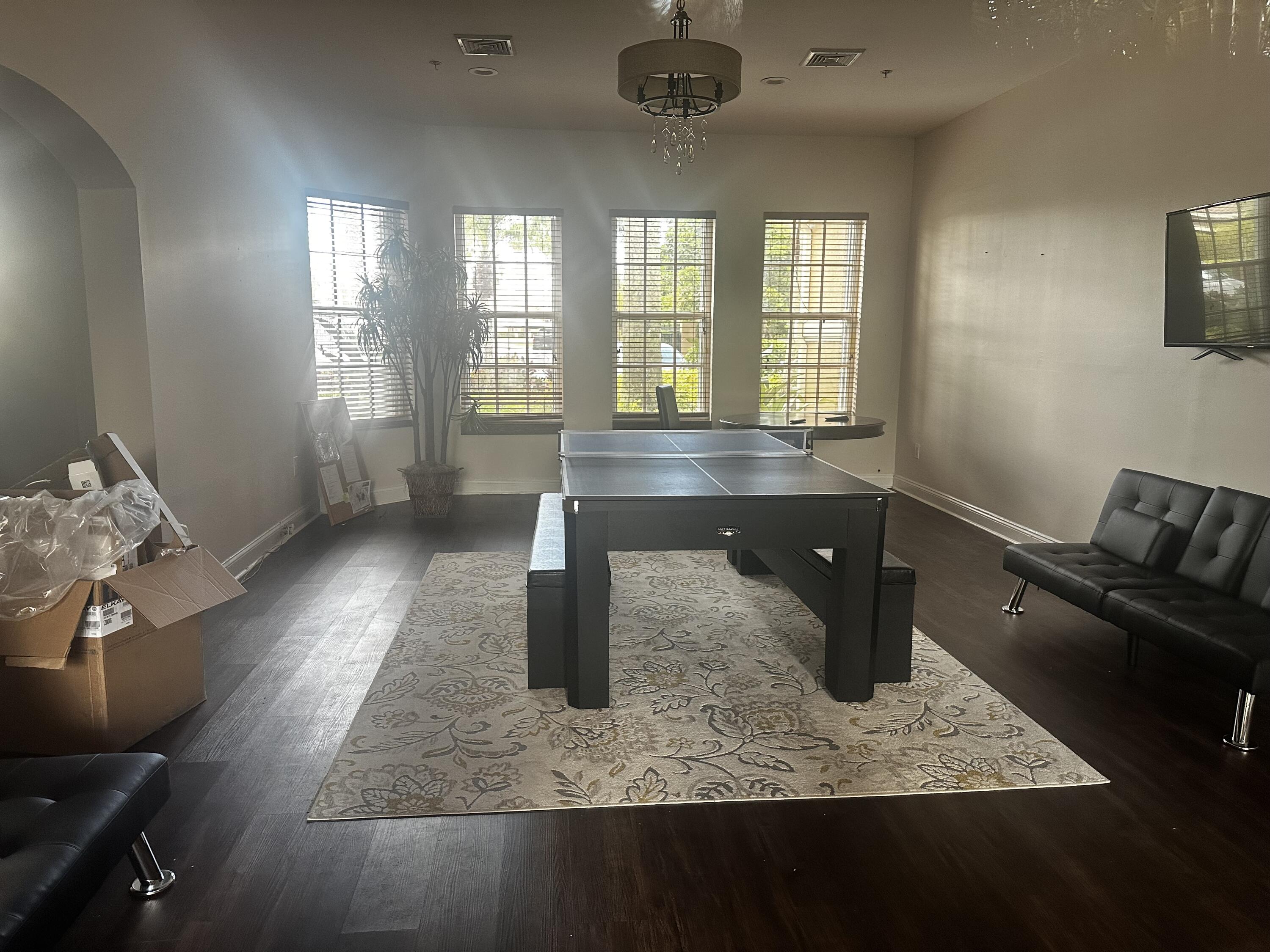 3615 Northwest Mediterranean Lane, Unit 13205 Jensen Beach, FL 34957 - Photo 4 of 14 a room with natural light