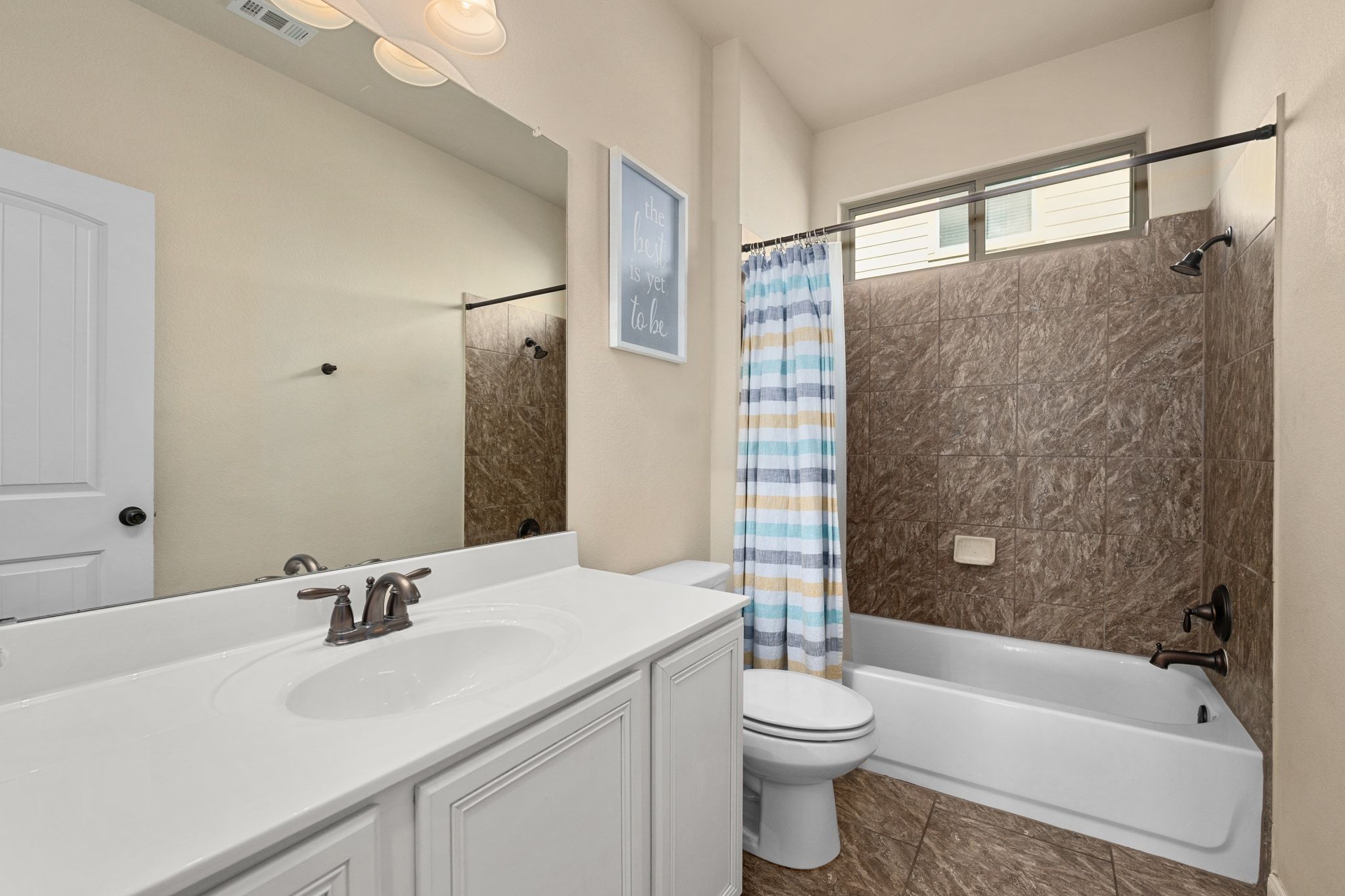 738 Palo Duro Loop Round Rock, TX 78664 - Photo 16 of 32 A full bath with a shower/tub combo is located on the main level.