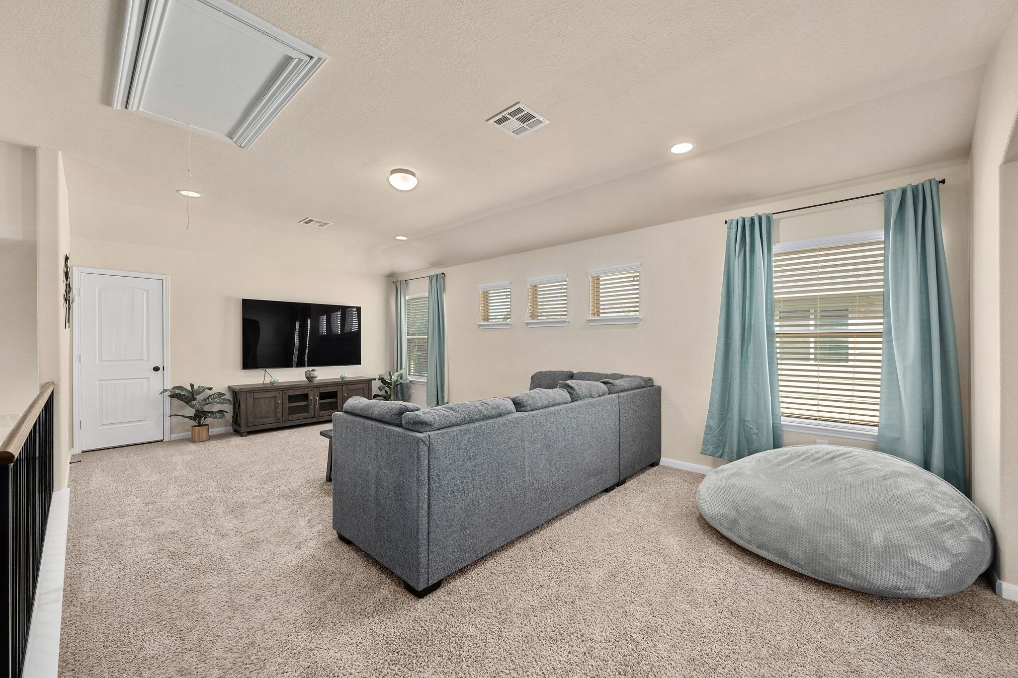 738 Palo Duro Loop Round Rock, TX 78664 - Photo 23 of 32 This space is generously sized for a secondary living room.