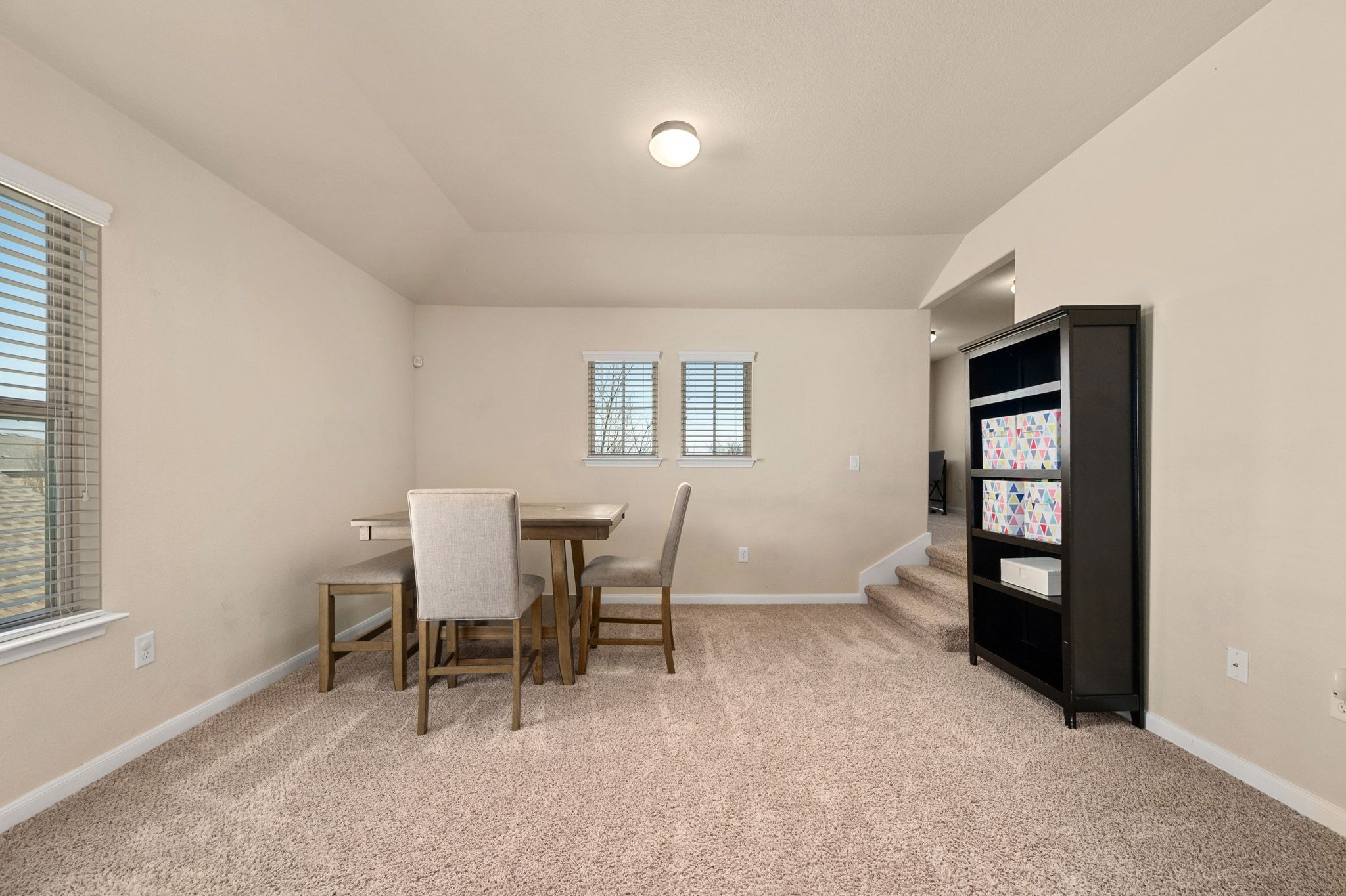 738 Palo Duro Loop Round Rock, TX 78664 - Photo 25 of 32 This area is perfect for a game room/playroom!