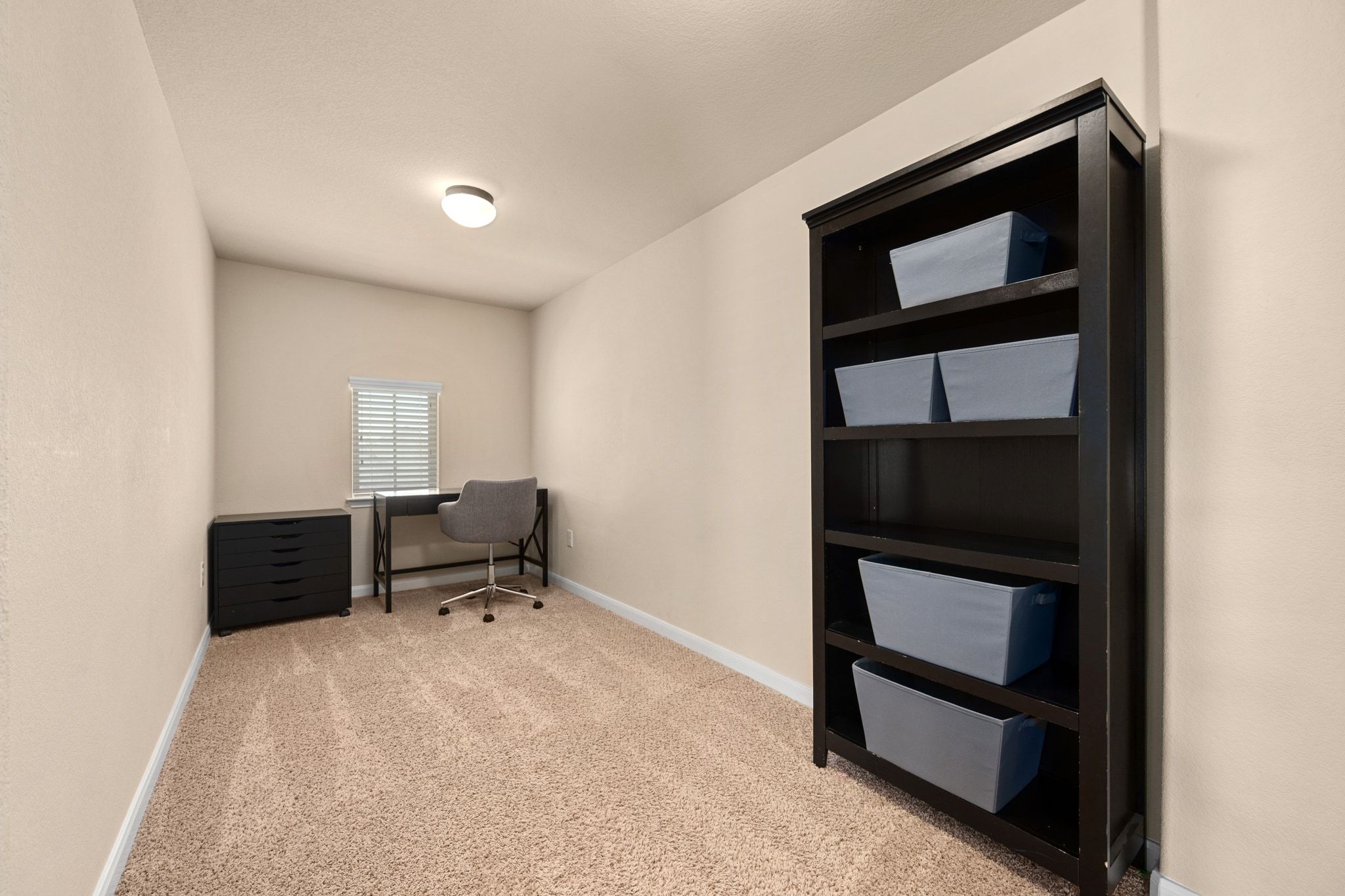 738 Palo Duro Loop Round Rock, TX 78664 - Photo 27 of 32 This charming room could be your home office, study/homework space, craft room, yoga studio, or reading room.