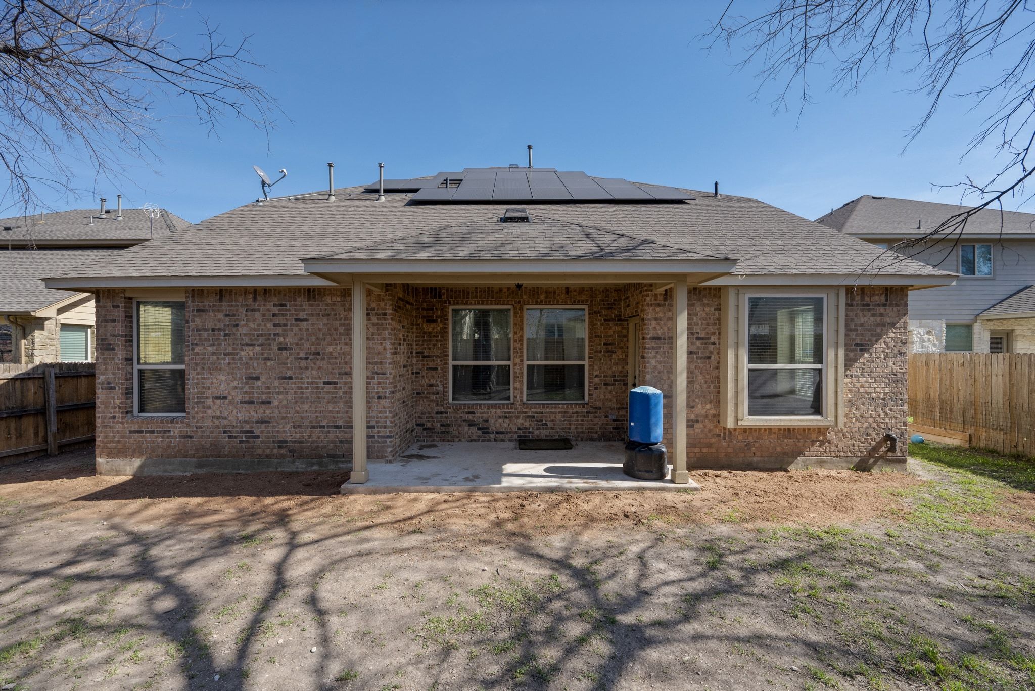 738 Palo Duro Loop Round Rock, TX 78664 - Photo 31 of 32 The back patio is the perfect size for grilling. This home offers PAID OFF SOLAR PANELS for energy efficiency/lower monthly expenses.