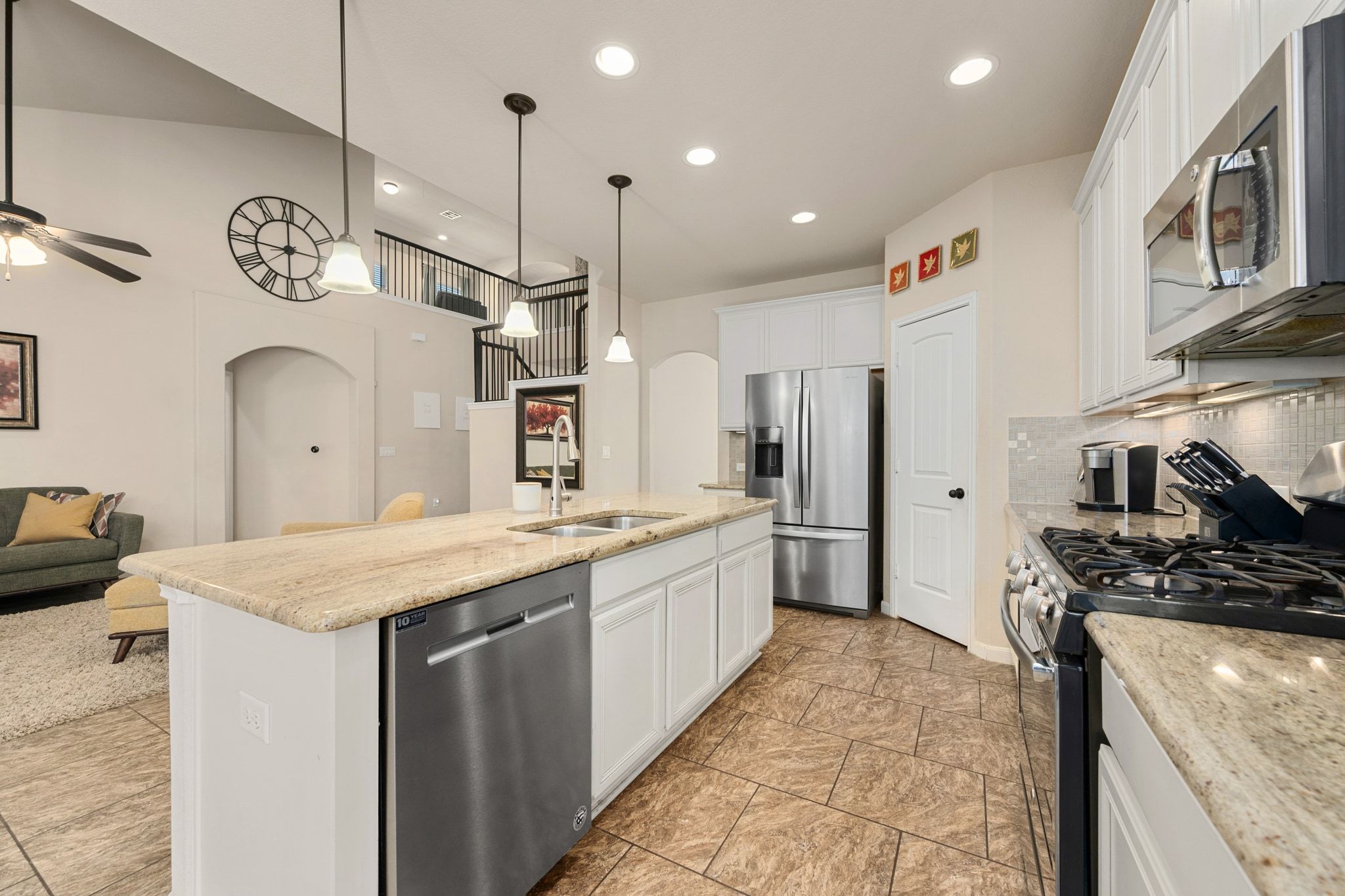 738 Palo Duro Loop Round Rock, TX 78664 - Photo 6 of 32 Stainless steel appliances are available in the kitchen, including a gas cooktop.