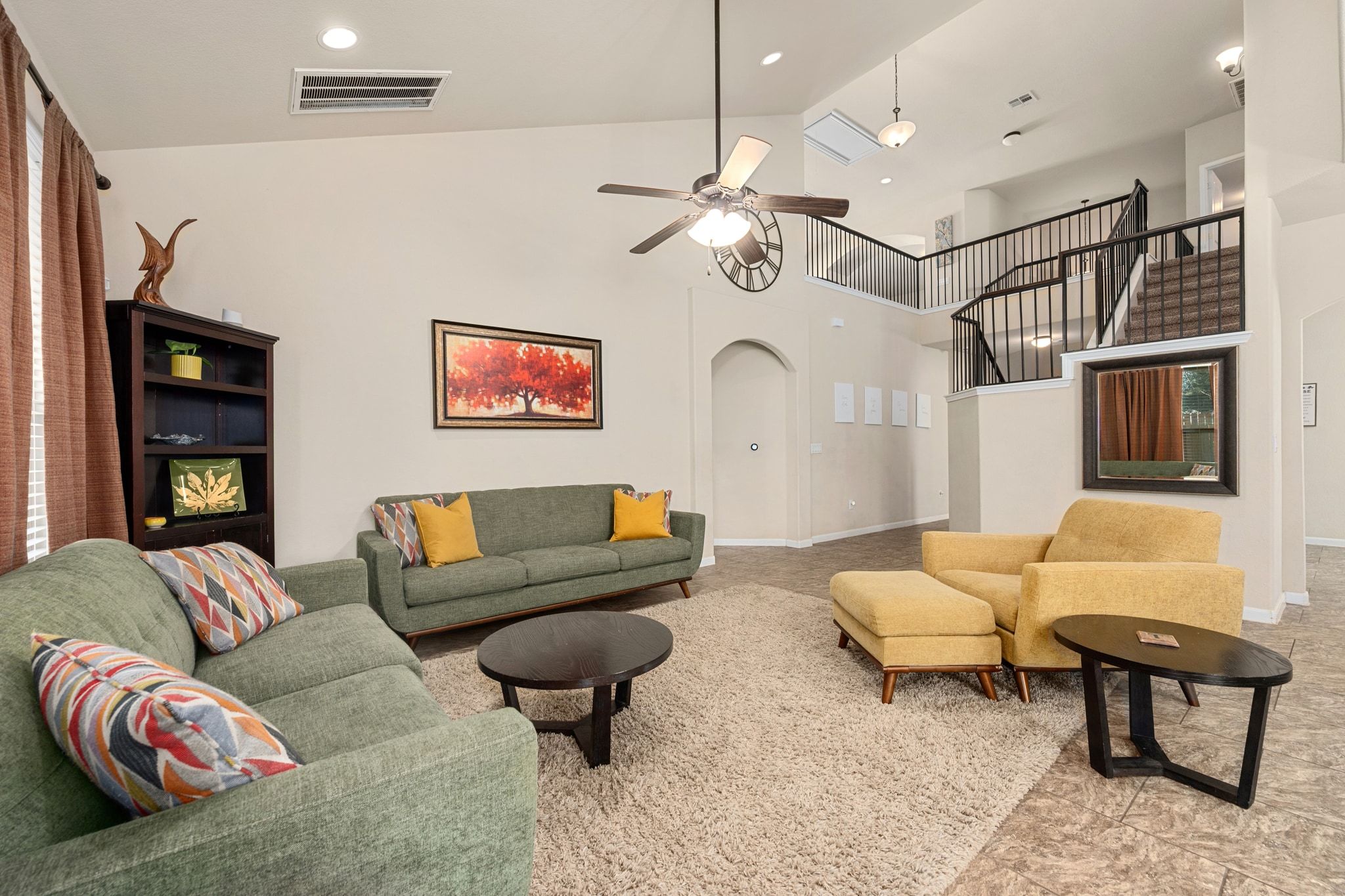 738 Palo Duro Loop Round Rock, TX 78664 - Photo 10 of 32 The living room offers recessed lighting and a ceiling fan.
